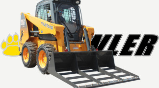 Skid Steer Equipped with Land Leveler